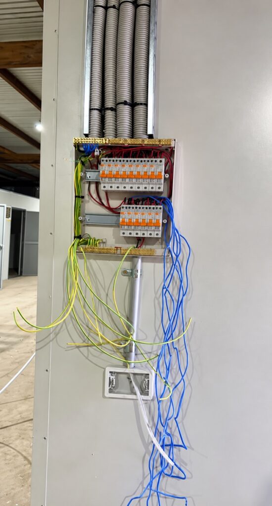 Switchboard being installed during a commercial fit-out