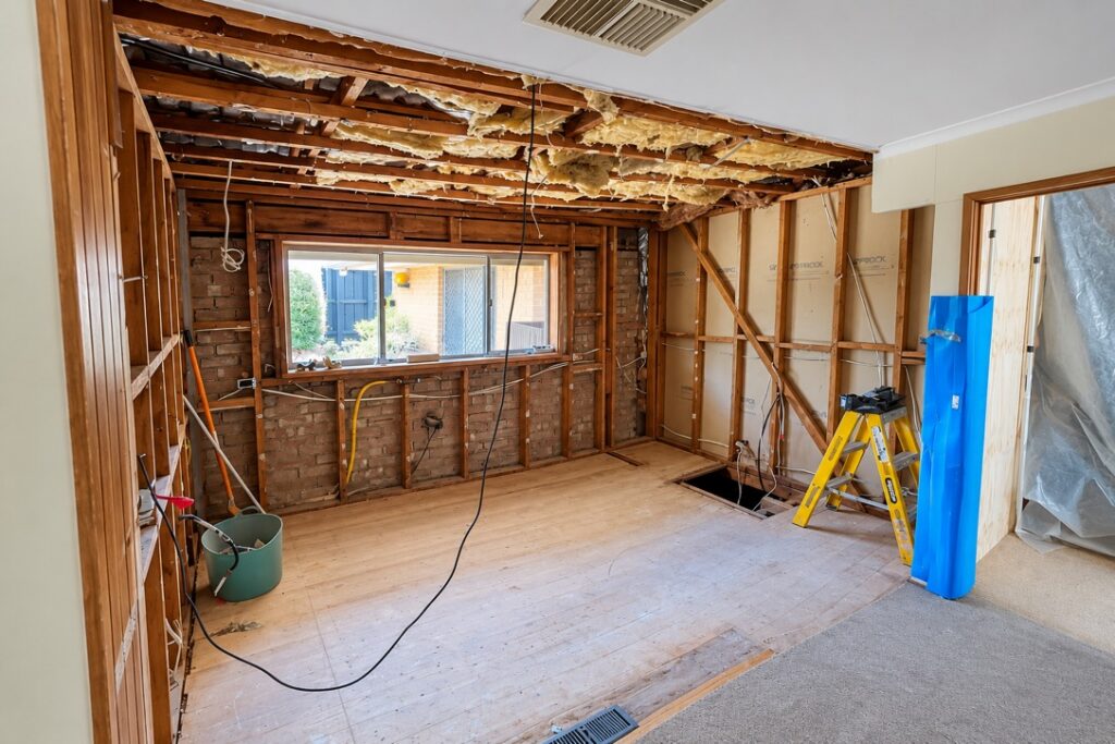 Kitchen opened up to the frame for new services during a renovation