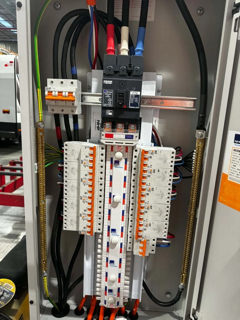 Commercial switchboard with a main switch, circuit breakers and safety switches (RCBOs) installed in a steel enclosure